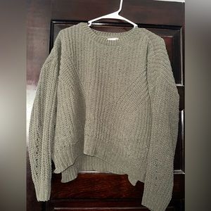 It is a cropped sweater but is super soft and comfy for the fall time!